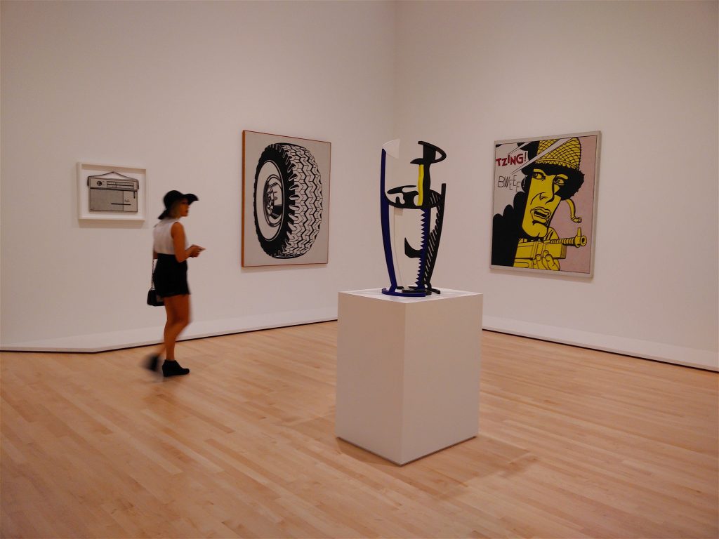 woman in Lichtenstein gallery at SFMOMA, Lichtenstein gallery at SFMOMA, SFMOMA, San Francisco Museum of Modern Art, museums in San Francisco, San Francisco, Roy Lichtenstein, art of Roy Lichtenstein, art, American art, Modern art, pop art, graphic art, woman in hat, woman appreciating art, woman in art gallery, woman in a museum, art appreciation, culture, painting, museums, sculpture, Modernism, American culture, American pop culture, travel