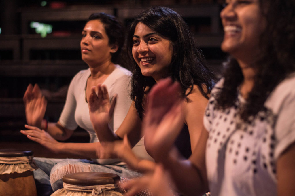 girls drumming, workshop at Adishakti Theatre, Adishakti, Adishakti Theatre, performing arts, drumming workshop, theatre, experimental theatre, plays, music, drumming, theatre workshop, music workshop, arts, Pondicherry, Puducherry, Villupuram District, Tamil Nadu, India, South India, culture, theatre commune, theatre community, eco travel, green travel, voluntourism, self-sustaining communities, volunteer opportunities, travel